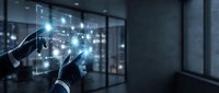 Businessman touching digital network interface with glowing connections in modern office environment for technology and innovation concepts.