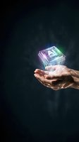 Hand holding glowing microchip with AI core text and purple-green neon light effects against dark background for technology and innovation concepts.