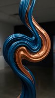 Abstract blue and copper metallic twisted ribbons flowing in dynamic spiral motion creating modern artistic sculpture with reflective surfaces and smooth curves.
