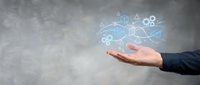 Business hand presenting digital network icons and connectivity symbols floating above palm against gray background for technology presentations.