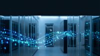 Modern data center server room with glowing blue digital network connections and flowing light streams representing cloud computing and information technology.