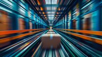 Modern subway train interior with motion blur effect, orange and blue lighting, vanishing point perspective, commuter transportation concept.