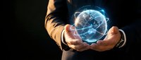Businessman holding glowing digital globe with network connections, representing global business, technology, and international commerce on dark background.