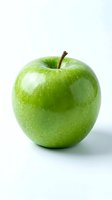Fresh green apple with water droplets isolated on white background, suitable for food, nutrition, health and wellness design projects.
