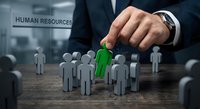 HR manager selecting green candidate figure from group of applicants for recruitment and talent acquisition in corporate office environment.