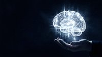 Digital brain hologram floating above open palm with glowing neural networks and data streams on dark background for artificial intelligence concepts.