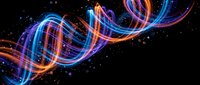 Abstract flowing light trails in blue and orange colors creating dynamic wave patterns against black background with glowing particles and energy effects.