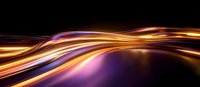 Dynamic glowing orange and purple light trails flowing across dark background create futuristic motion effect with smooth curved lines and energy streams.