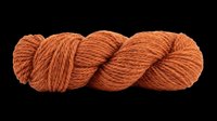 Twisted skein of orange wool yarn isolated on transparent background, ready for crafting, knitting, textile, sticker, t-shirt design, and print on demand use.