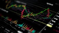Colorful stock market chart with vibrant green and pink trend lines showing financial data analysis on dark background for trading and investment decisions.