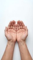 Two open cupped hands with palms facing up on a white background, symbolizing giving, receiving, prayer, or offering.