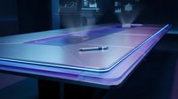 Futuristic holographic conference table with glowing edges and stylus pen in modern tech office environment for business presentations and meetings.