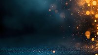 Magical glowing orange and gold bokeh lights scattered on dark turquoise background with sparkles and particles creating dreamy atmosphere.