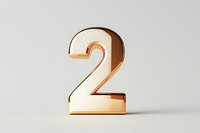 Golden metallic number two on light background, modern minimalist design with soft shadows and reflective surface. Suitable for typography and counting concepts.