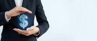 Businessman in dark suit holding glowing dollar sign symbol between hands, representing financial growth, investment, wealth management, and business success concepts.