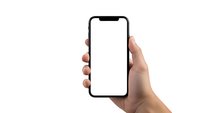 Hand holding modern smartphone with blank white screen isolated on white background for mobile app mockup and digital technology presentations.