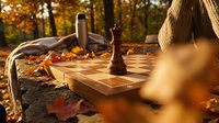 Autumn chess game outdoors with wooden board and pieces on park bench surrounded by golden fall leaves creating cozy seasonal atmosphere for strategic thinking.