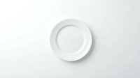 Empty white ceramic plate on clean white background isolated for kitchen dining restaurant menu design mockup.