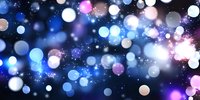 Glowing blue and pink bokeh lights on dark background create magical atmosphere with blurred circles and sparkles, suitable for festive designs and celebrations.