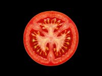 Tomato slice cross-section isolated on transparent background, ready for culinary design, food packaging, recipe graphics, t-shirt prints, stickers, and print-on-demand products.