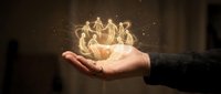 Businessperson holding glowing team figures in palm, symbolizing leadership, unity, and human connection in corporate environment for business concepts.
