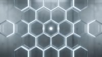 Glowing hexagonal molecular structure with interconnected geometric cells and luminous center point on gray background, suitable for science and technology concepts.
