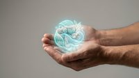 Male hands holding glowing turquoise energy sphere with swirling light patterns for digital art, fantasy concepts, and spiritual wellness designs.