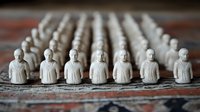 White chess pieces arranged in rows on textured surface, showing repetitive pattern of identical figures creating perspective depth effect. Focus on front row pawns.