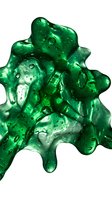 Vibrant emerald green gel or slime with glossy bubbles and dripping texture against white background for design projects.