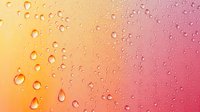 Water drops on glass surface with vibrant orange and pink gradient background creating dreamy bokeh effect. Natural condensation pattern adds depth and texture.