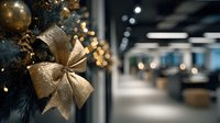 Elegant gold bow decoration on Christmas tree in modern office space with bokeh lights creating festive corporate atmosphere.