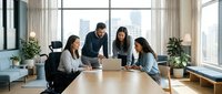 Diverse business team collaborating around laptop in modern office conference room with city skyline view during productive meeting session.