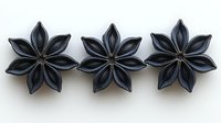 Elegant black paper origami flowers arranged in row on white background, handcrafted decorative elements with delicate petal details and subtle shadows.