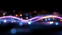 Magical glowing wave with sparkles and bokeh lights on dark background, flowing energy stream in purple and blue colors creating dreamy atmosphere.