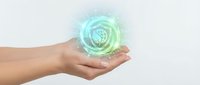 Hand holding glowing globe hologram with digital network connections, representing global communication, technology innovation, and worldwide business connectivity solutions.