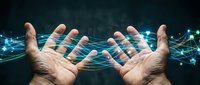 Male hands reaching toward glowing digital network connections with flowing light streams and data visualization effects on dark background.