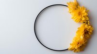 Black round frame decorated with vibrant yellow chrysanthemum flowers on light gray background, minimalist floral composition for wedding invitations and greeting cards.