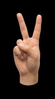 Human hand showing peace or victory sign gesture, isolated on transparent background. Ready for stickers, t-shirt design, clipart, print on demand, and sublimation projects.