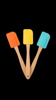 Three colorful silicone spatulas with wooden handles isolated on transparent background, ready for clipart, t-shirt design, stickers, and print-on-demand products.