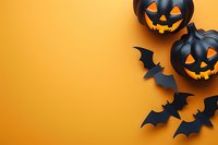 Black halloween pumpkins with glowing faces and flying paper bats on orange background, perfect for seasonal holiday designs and party invitations. Copy space included.