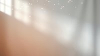 Soft blurred background with warm beige and white tones, sparkling bokeh lights creating dreamy atmosphere for overlay and design projects.