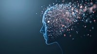 Digital human head silhouette dissolving into glowing pink and blue particles against dark background, representing artificial intelligence and mind technology.