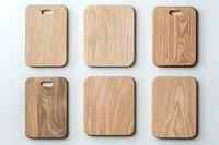 Wooden cutting boards collection on white background. Natural oak kitchen accessories with different shapes and wood grain patterns isolated and ready for design use.