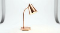 Copper desk lamp with sleek metallic finish on a light background, perfect for modern interior and home office decor concepts.