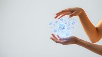 Female hands protecting holographic global network with digital icons representing connectivity, technology innovation and cyber security solutions.