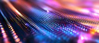 Vibrant LED display panel with colorful pink and blue light effects creating futuristic technology background with selective focus and bokeh pattern.