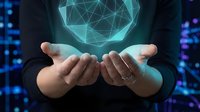 Businessman hands holding glowing geometric heart shape with digital network connections in futuristic technology environment for healthcare innovation.