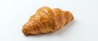 Freshly baked croissant with golden, flaky layers isolated on white background, ready for bakery, food, and culinary design projects.