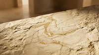 Natural marble stone surface with golden veining and organic patterns for luxury interior design and architectural applications.