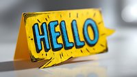 Bright yellow speech bubble with blue "HELLO" text on folded card, creating friendly greeting for correspondence or welcome messages.